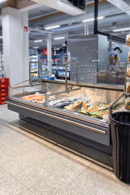 A serve-over refrigeration counter