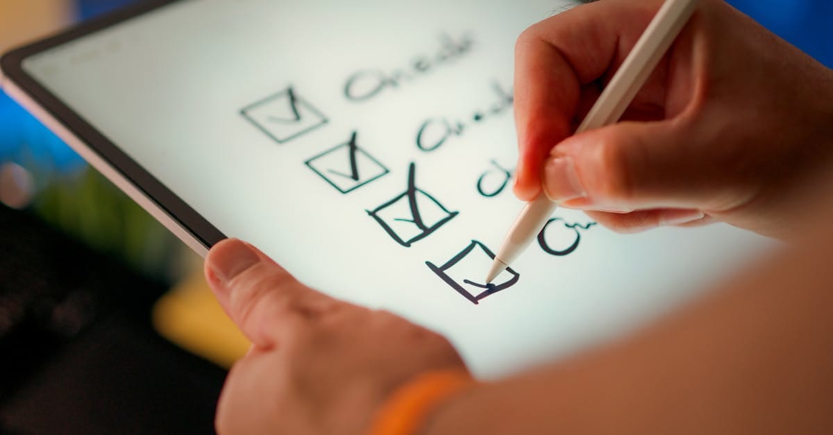 Hand Holding Digital Tablet with Stylus Marking Checkboxes on an Electronic Checklist Displayed on Screen