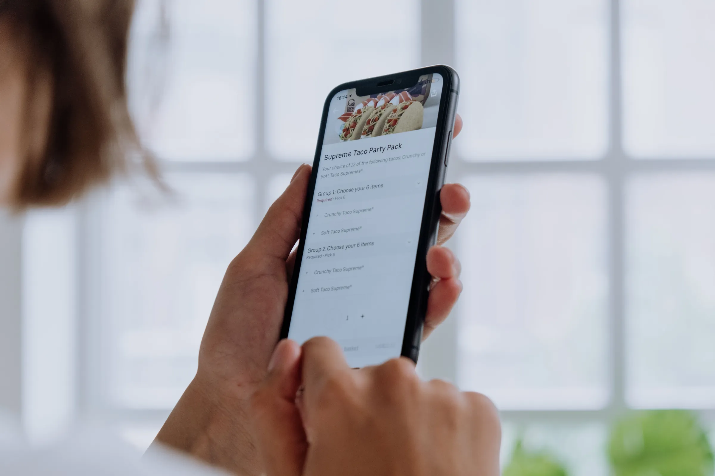 Customer placing an online takeaway order on a smartphone