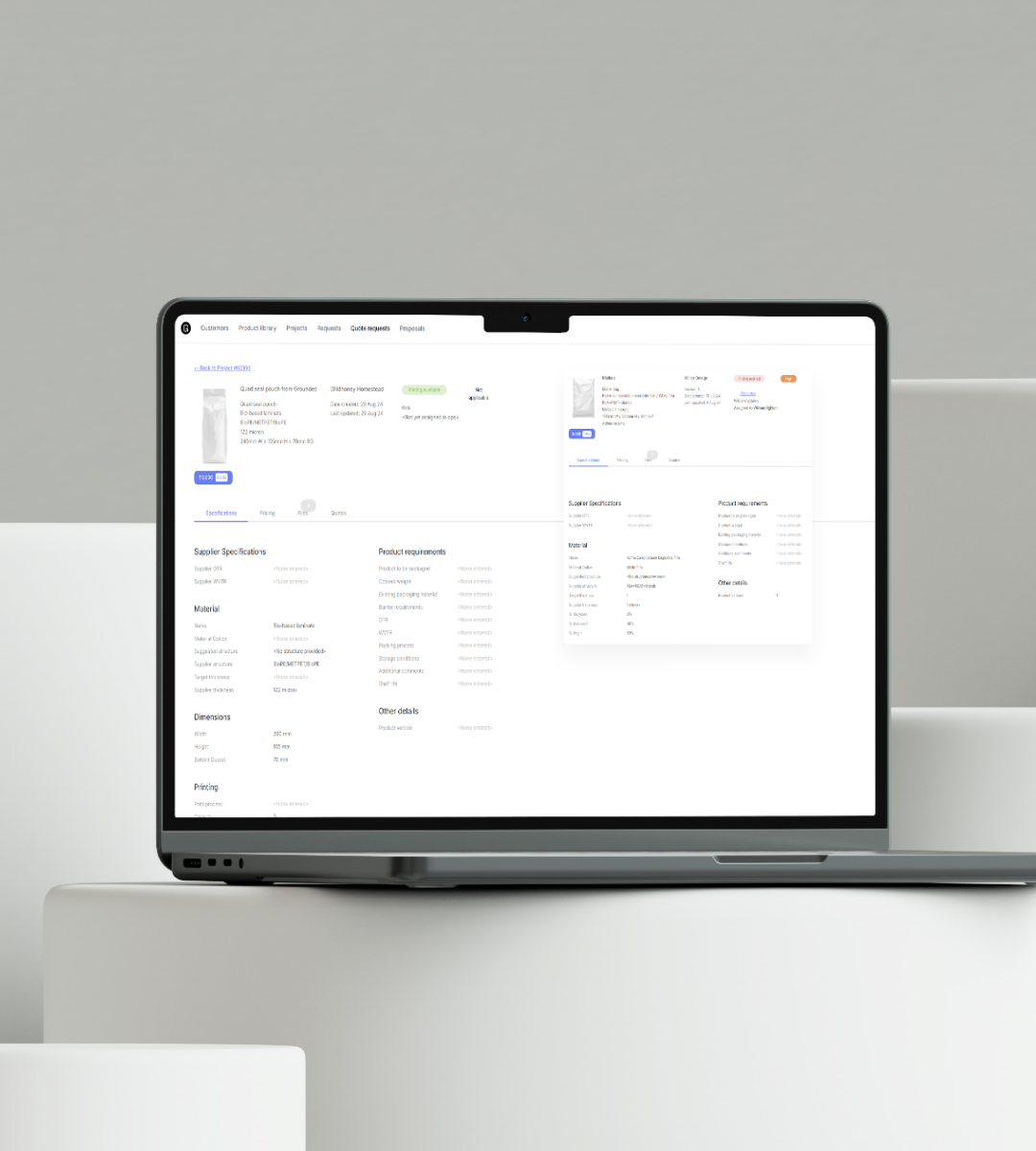 laptop with pacflow dashboard ui on screen