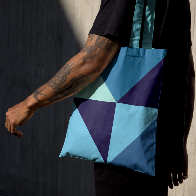 Close-up of a stylish tote bag with bold geometric design.
