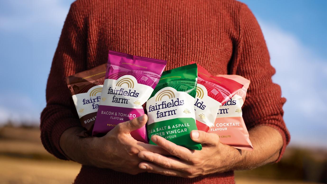 A person holding a variety of foodAI-generated content may be incorrect.