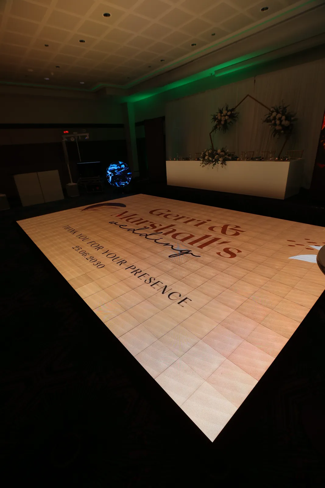 Close view of the Stomp interactive LED dance floor at Rendezvous Hotel Scarborough showing Gerri & Marshall's wedding message