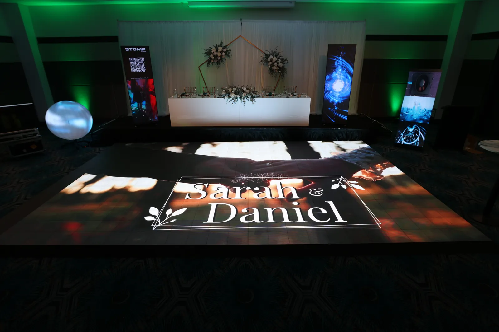Stomp interactive LED dance floor at Rendezvous Hotel Scarborough showing custom wedding names for Sarah & Daniel
