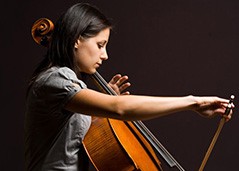 Talented student immersed in cello lessons, mastering techniques with dedication