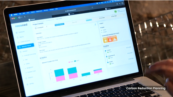 Laptop screen opened on Nocomed software showing a carbon analytics and SDG goals screeni