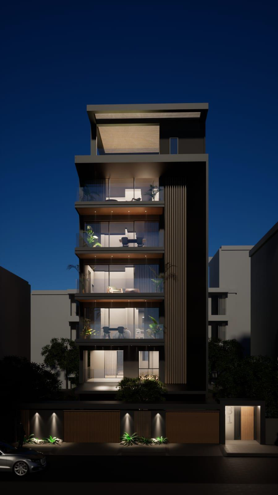 Gated new-build residence at night on the Athens Riviera