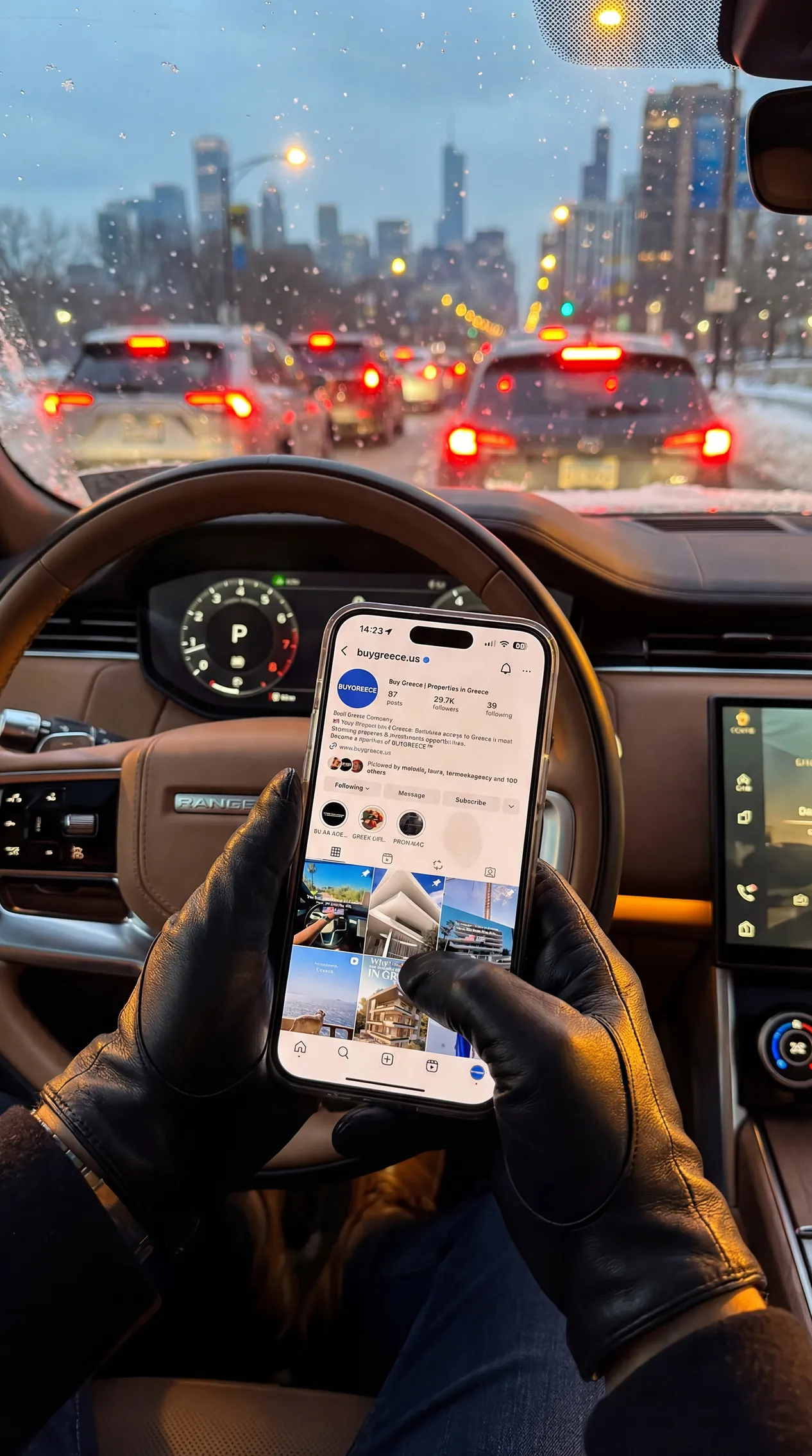 Checking BUY GREECE® listings on a phone in Chicago traffic
