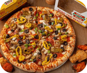 close up of a hunt brother's veggie pizza.