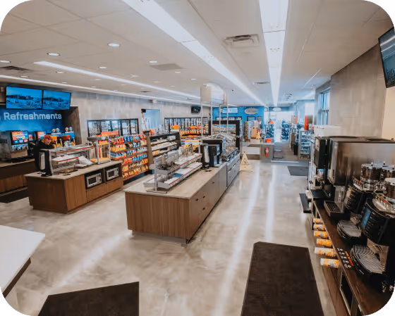 Interior full shot of a U-Stop convenience shop by the snack section