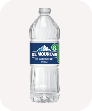 A clear plastic bottle with a blue label displaying white mountains and "Ice Mountain" text. It holds 33.8 oz of 100% natural spring water sold at u-stop. 