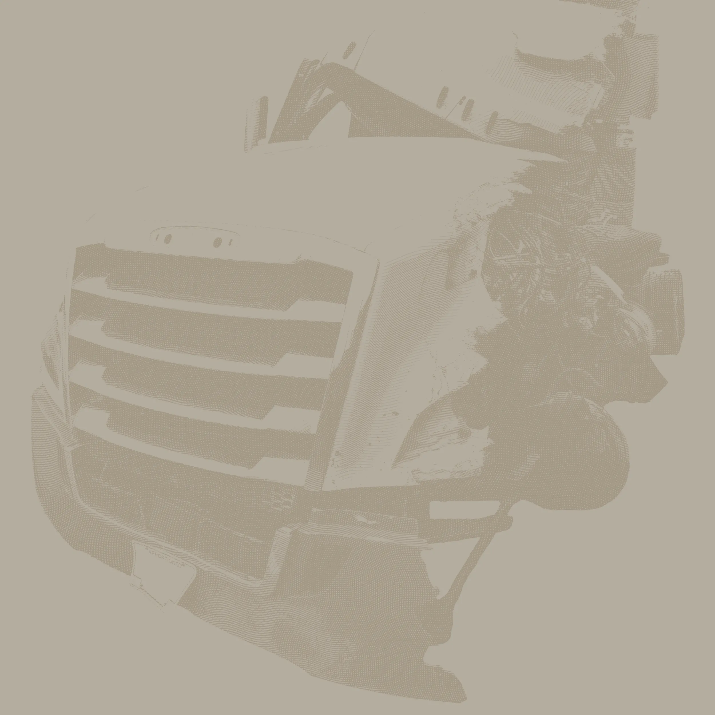 Front view of a large semi-truck with a prominent grille and side mirrors.