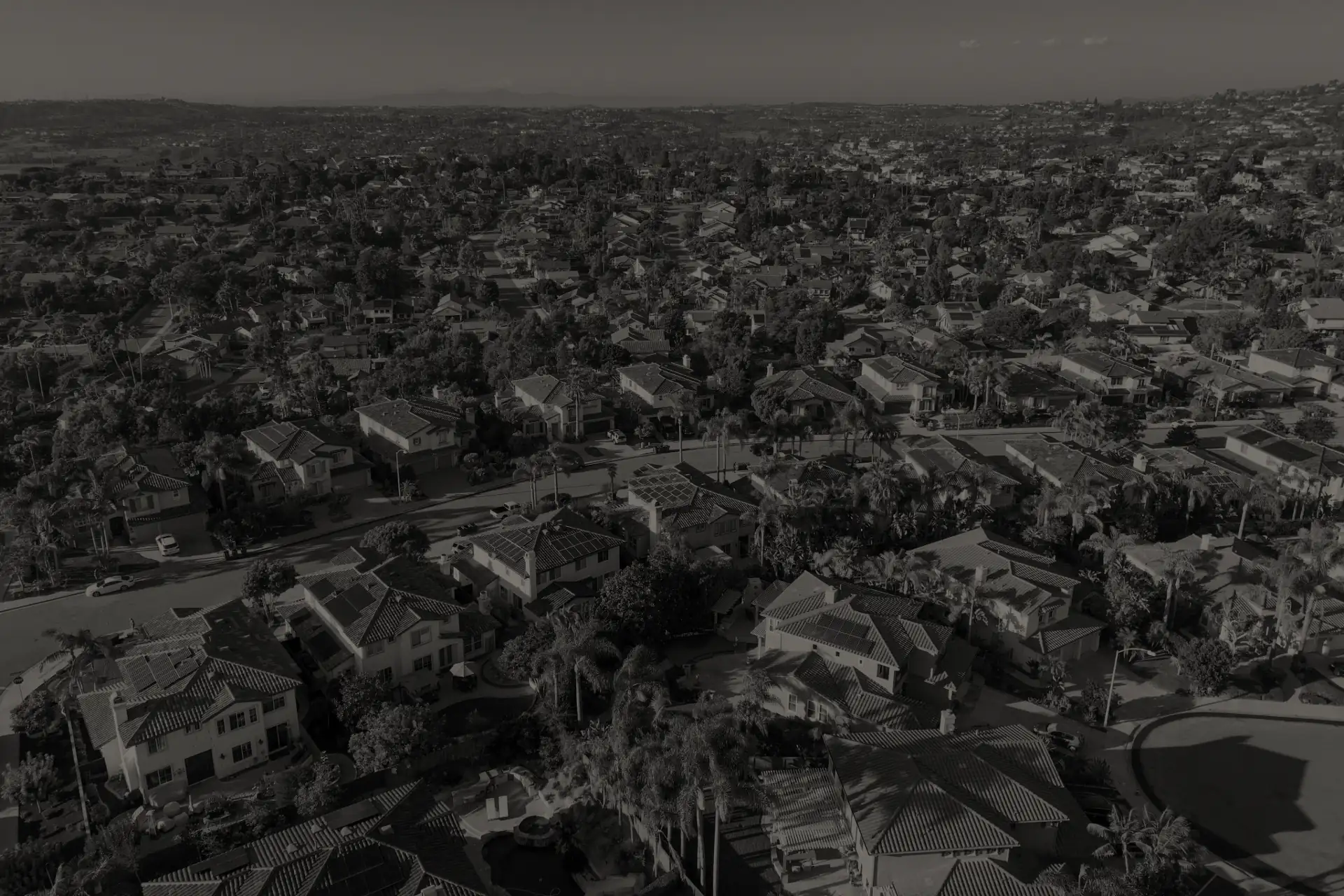 Aerial view of a large residential neighborhood in Vista with many houses and trees.