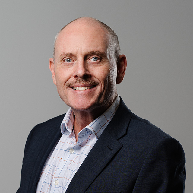 Portrait of Paul Miller, Executive Director at Base2.