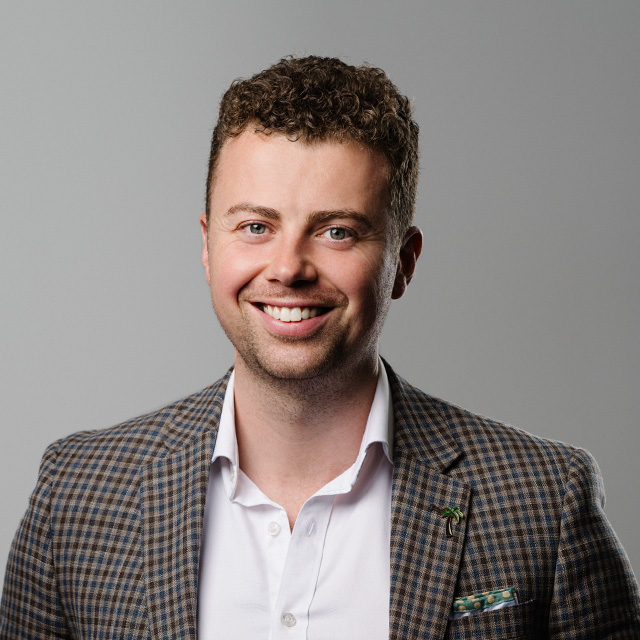 Portrait of Cody Harmon, CEO of Base2 Asset Management