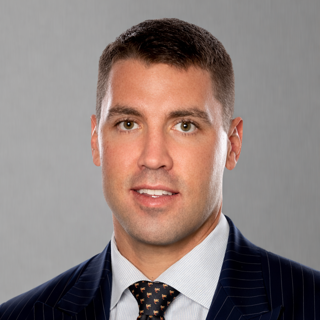 Portrait of Cody Harmon, CEO of Base2 Asset Management.