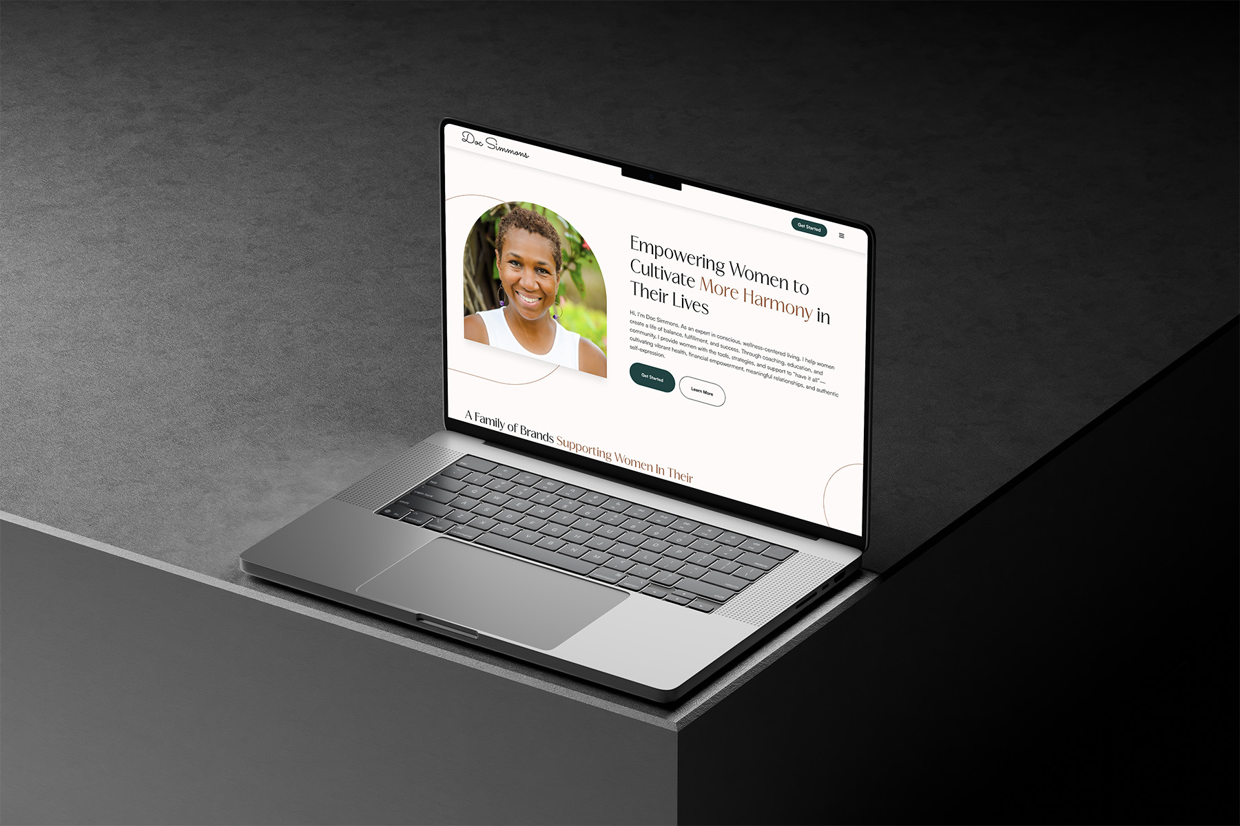 The website of Doc Simmons displayed on a laptop