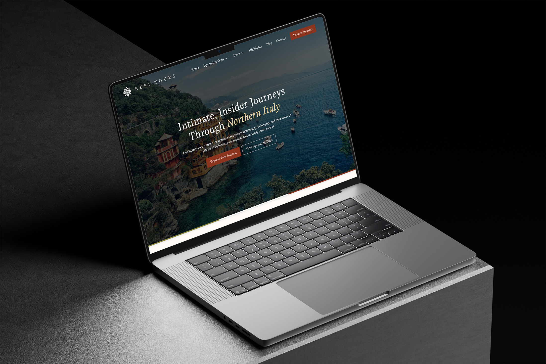 The website of Kefi Tours displayed on a laptop