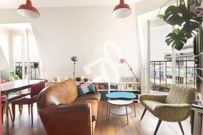 Un appartement familial baigné de lumière avec une vue exceptionnelle sur Paris