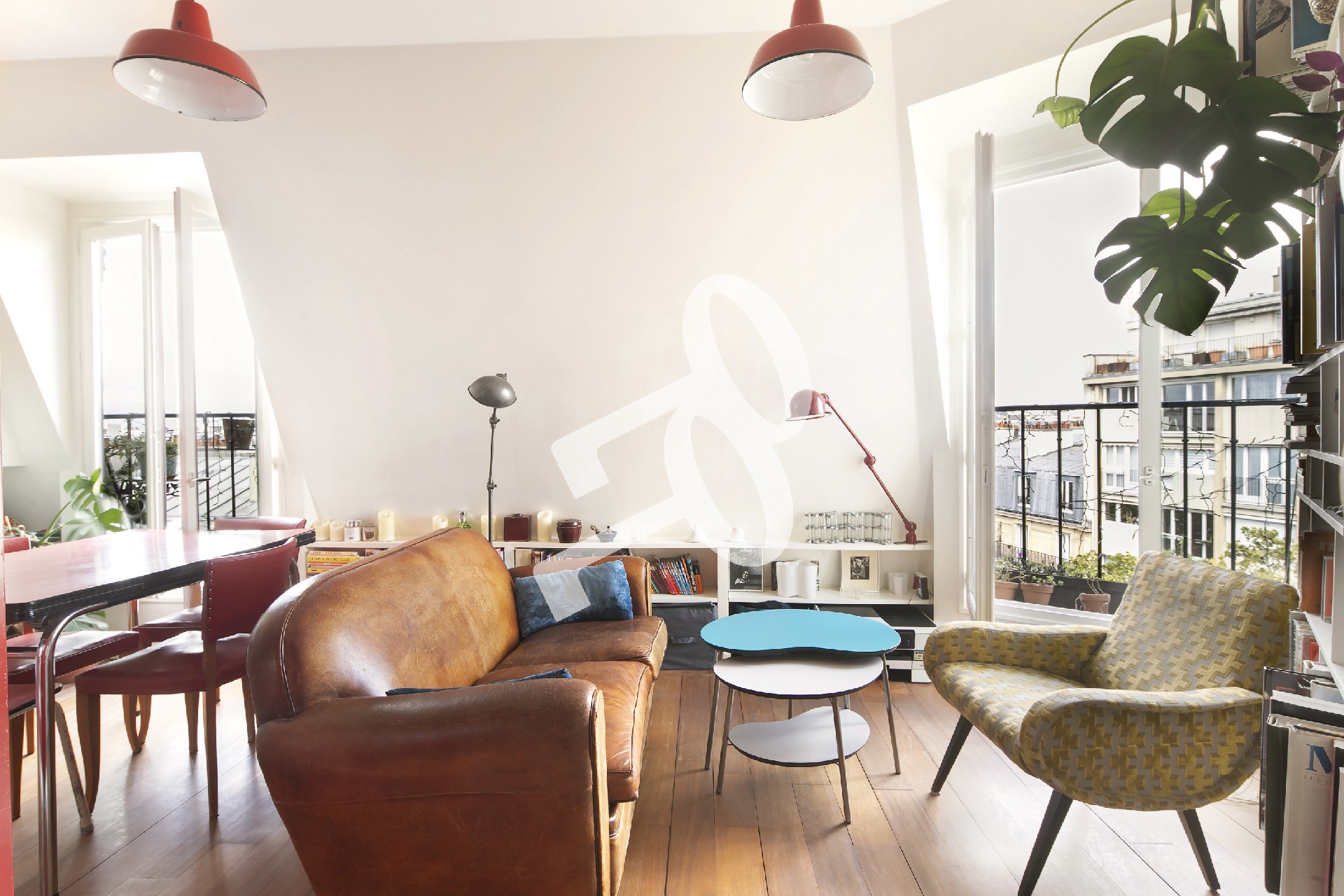 Un appartement familial baigné de lumière avec une vue exceptionnelle sur Paris