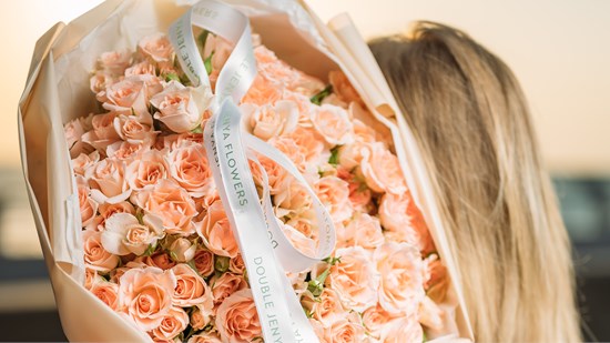 Bouquet made of a combination of peony roses, spray and single roses, chrysanthemums, hypericum, and eucalyptus / Source: DJflowers Shop (EZ Newswire)