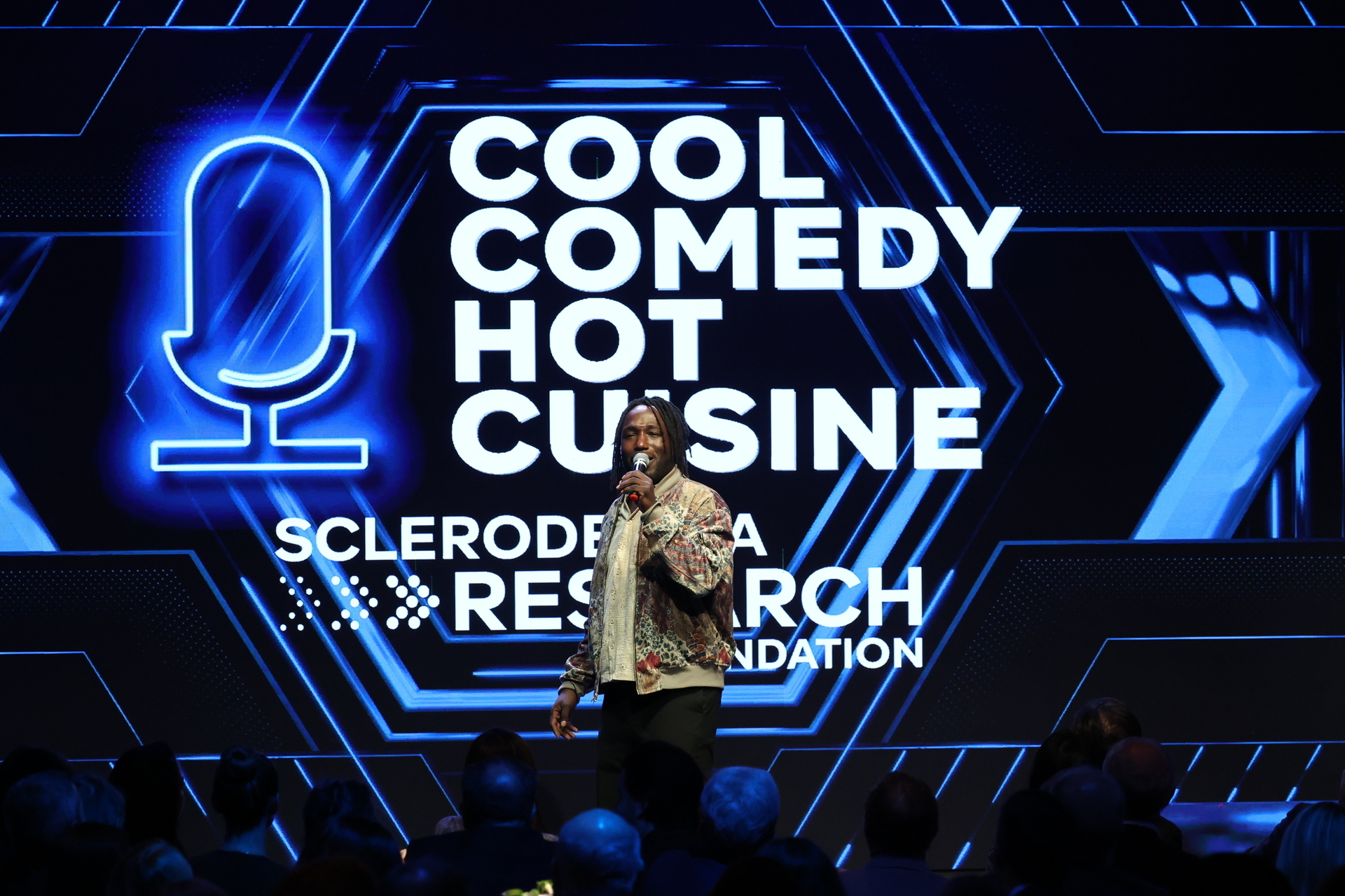 NEW YORK, Nov. 12, 2025 — Hannibal Buress speaks onstage during the Scleroderma Research Foundation’s Cool Comedy • Hot Cuisine event at the Edison Ballroom in New York City. (Photo by Kevin Mazur/Getty Images for the Scleroderma Research Foundation) / Source: Scleroderma Research Foundation (SRF) (EZ Newswire)