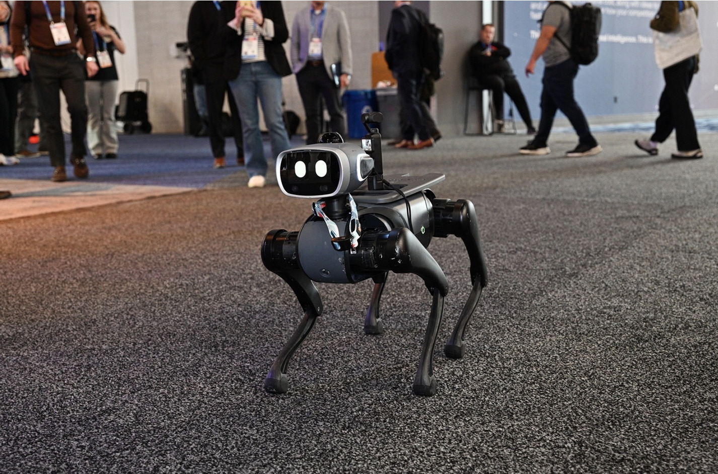 Caption: Vbot SuperDog transforming into an "exhibition blogger" by connecting an action camera via its versatile expansion backplane at the CES 2026 site. / Source: Vbot (EZ Newswire)