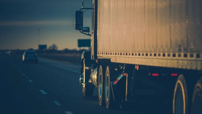 Commercial semi-truck traveling on a highway
