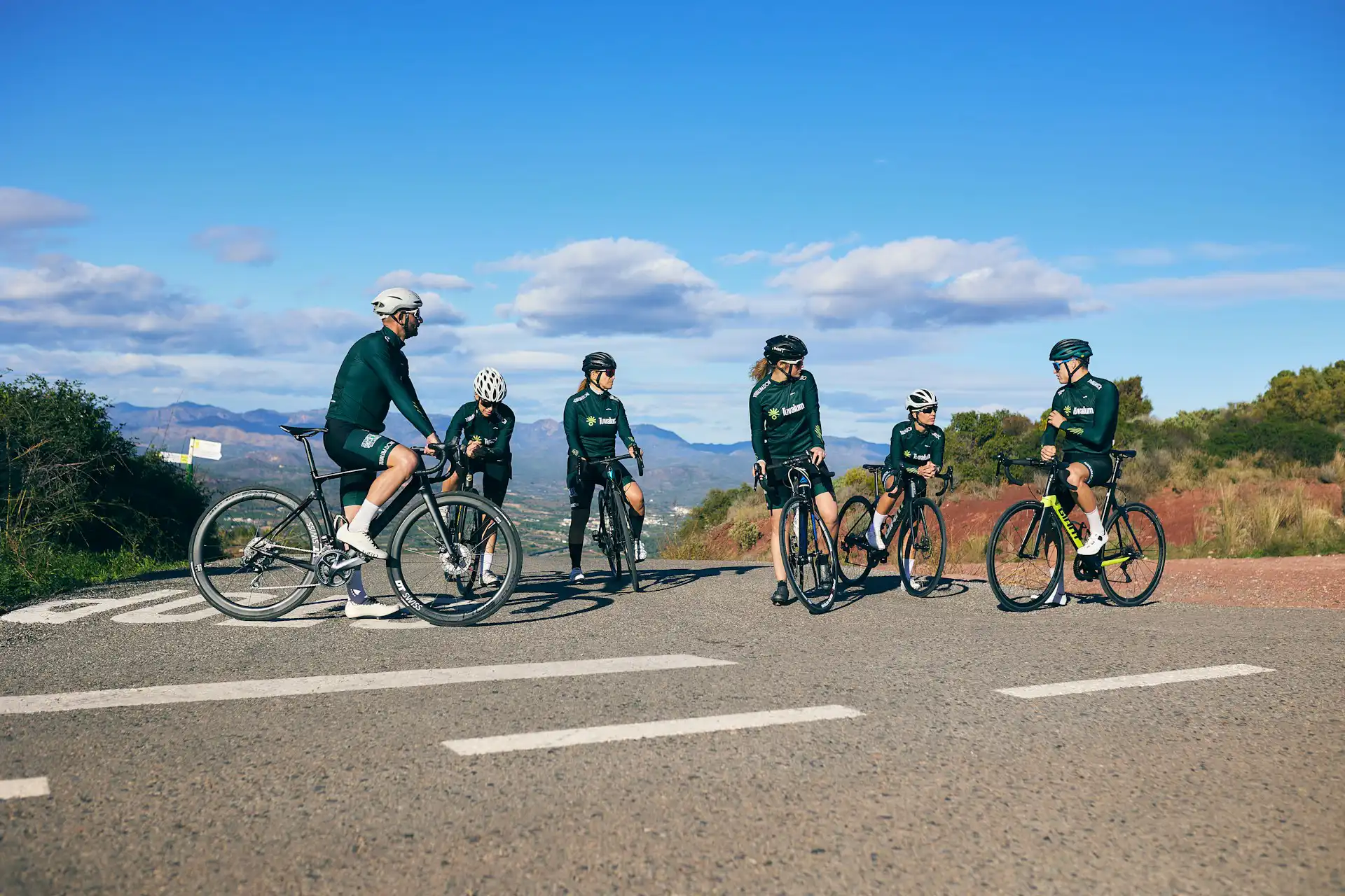 Cyclists stopped to rest during a group ride
