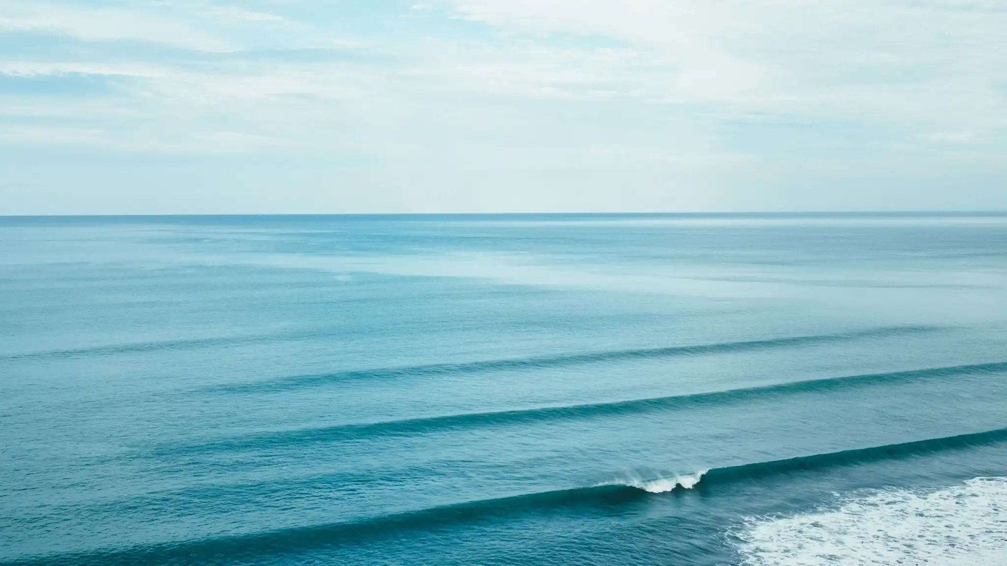 Blue ocean waves aerial