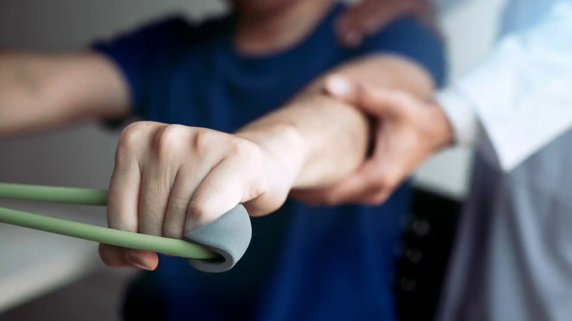 Man with spinal cord injury engaged in rehabilitation in San Diego