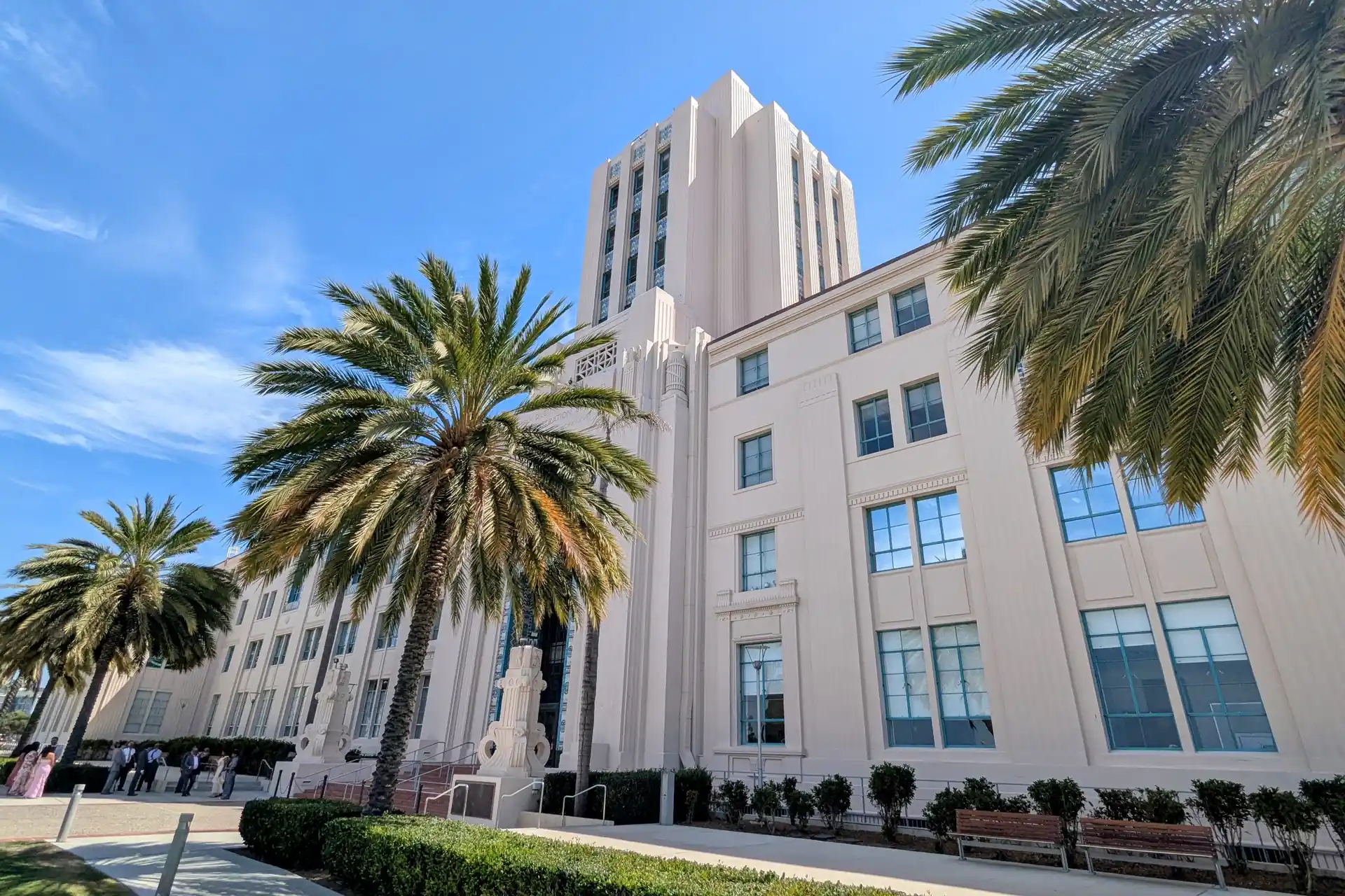 San Diego County Administration Center, a public government building in downtown San Diego, framed by palm trees.