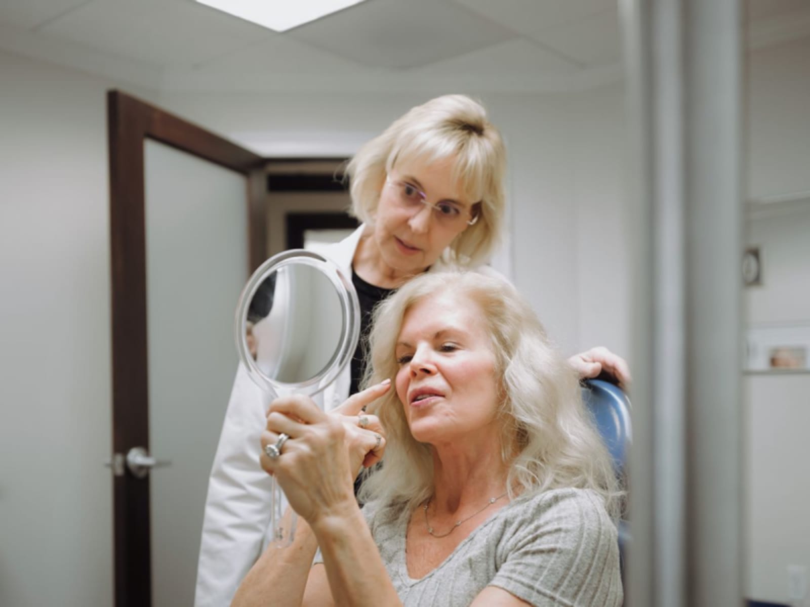 Dr. Preussner greeting a patient during a dental appointment
