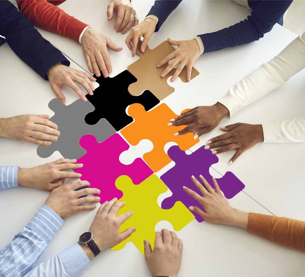 Partners placing puzzle pieces together.