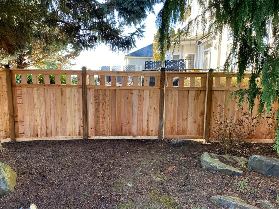 Cedar Lexington privacy fence bordering a lawn in Everett