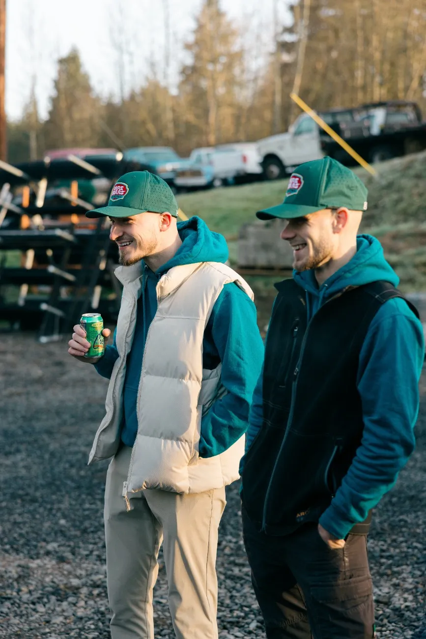 Two fence builders enjoying their chat after fencing project in Seattle