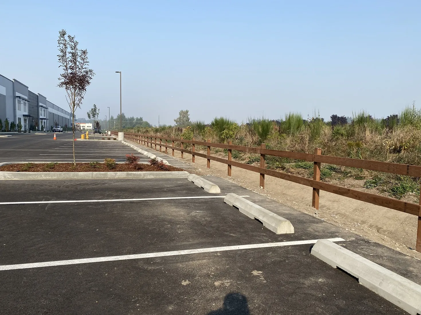 Split rail fence with cedar rails and pressure-treated posts installed by Rare Bears Fencing