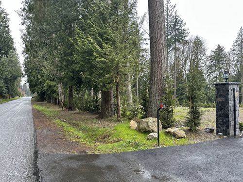 BEFORE Elegant Metal Fence Design for New Snohomish Home 
