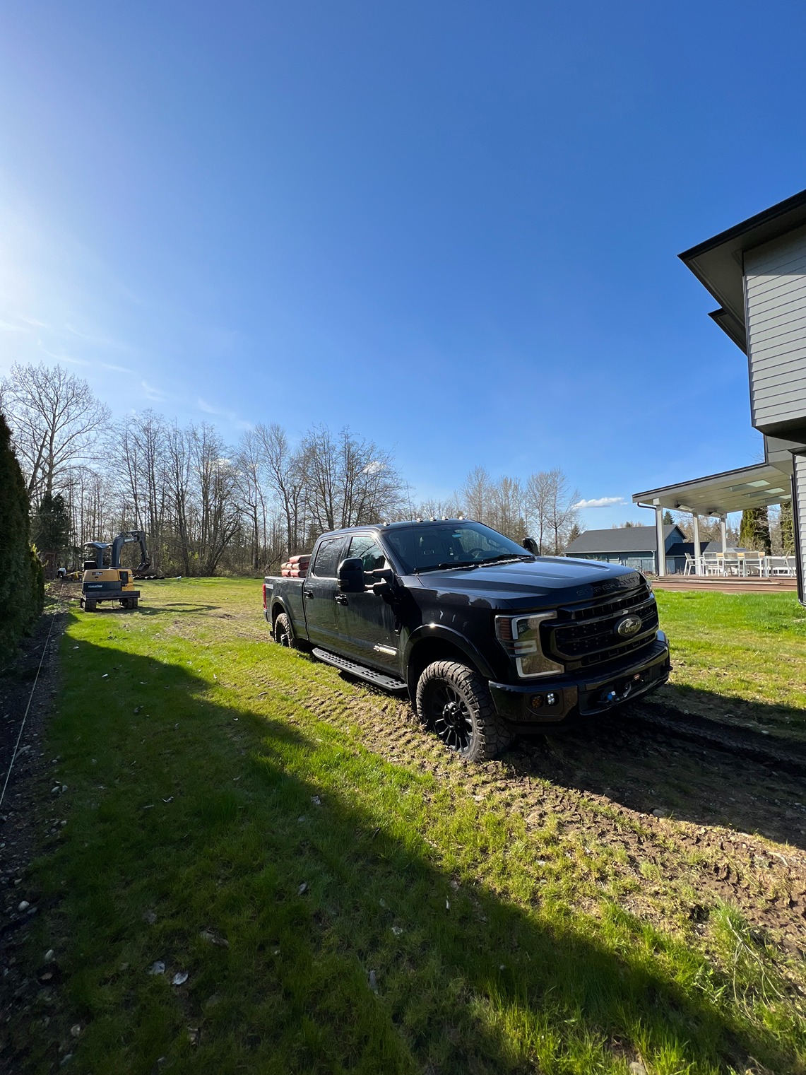 Before Black Chain Link Fence Adds Safety to Large Snohomish Yard