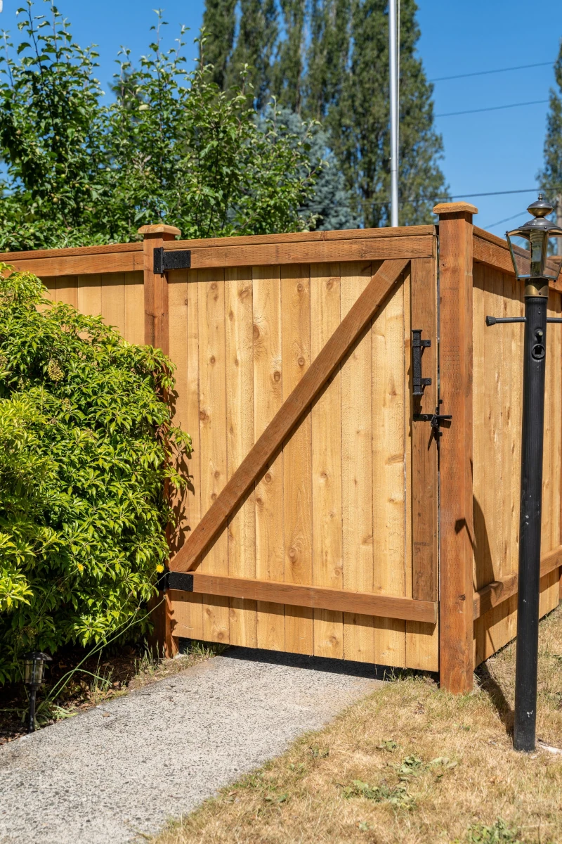 Double cedar privacy gates with black hardware in Shoreline WA