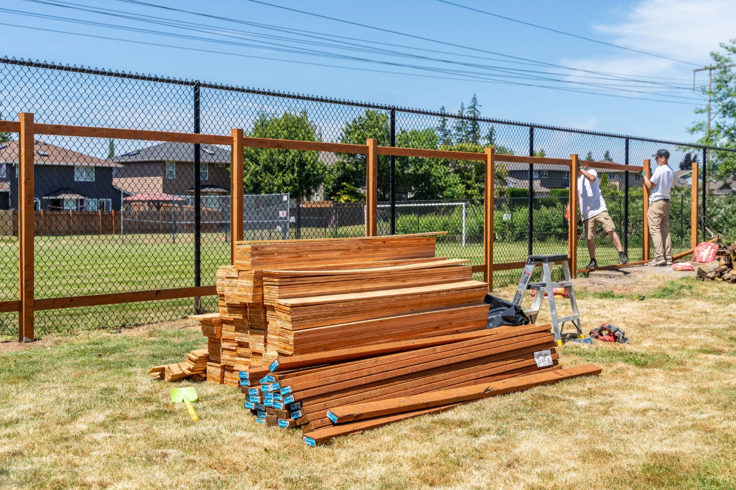 In-progress cedar privacy fence construction with new posts and rails in Snohomish WA 98296