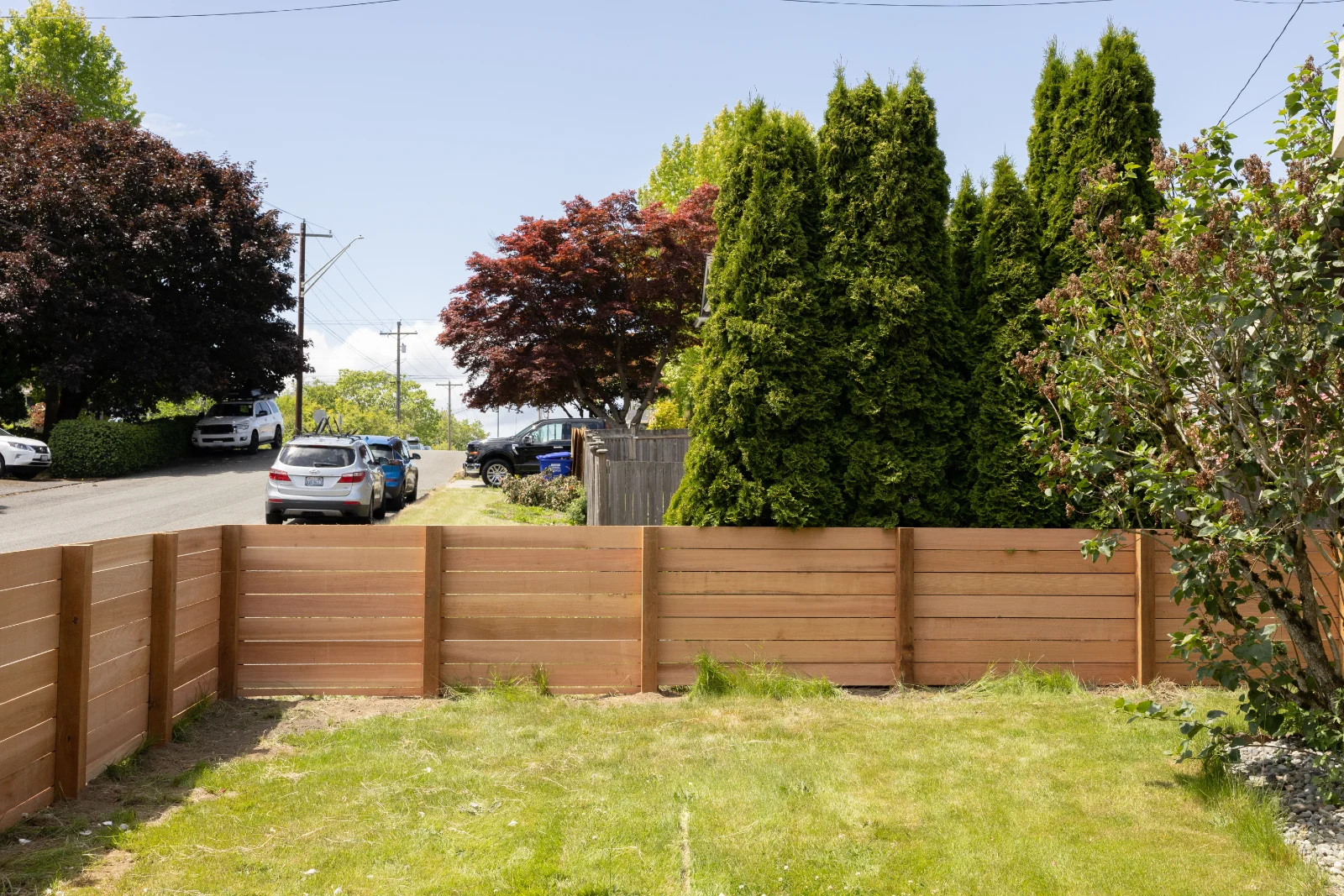 Horizontal wood panel fence