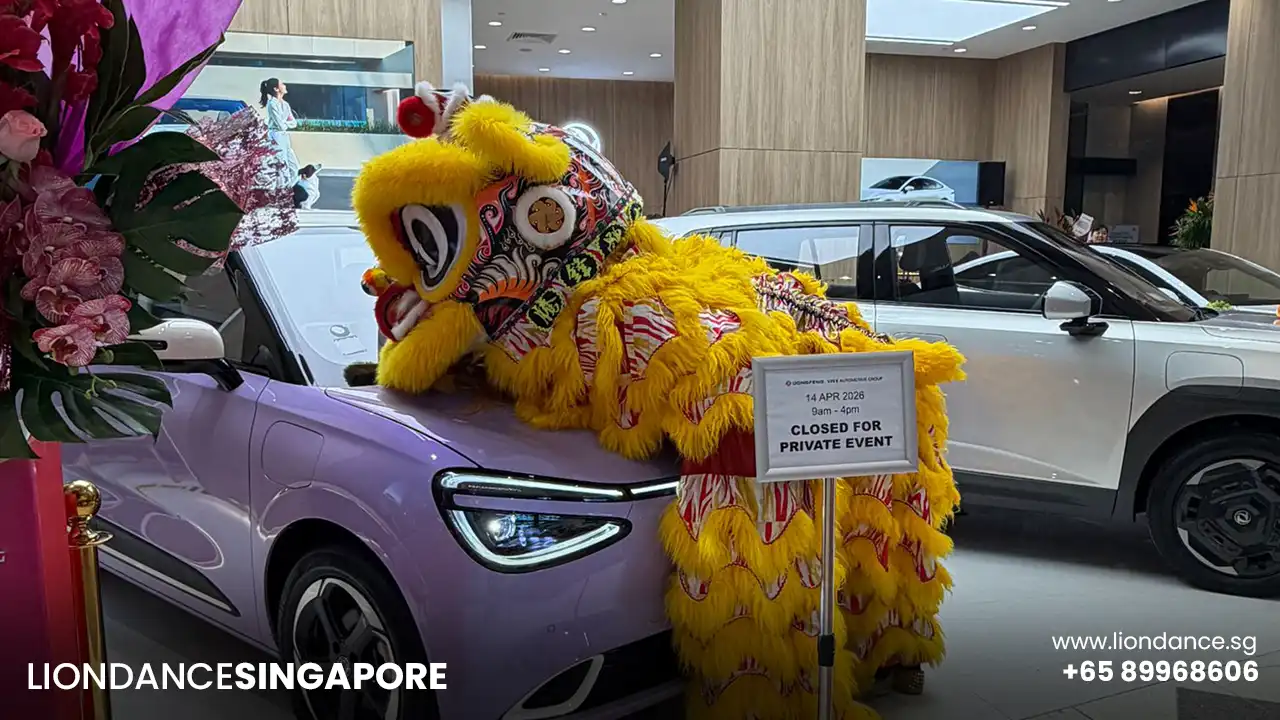 two lions performing cai qing at a mall