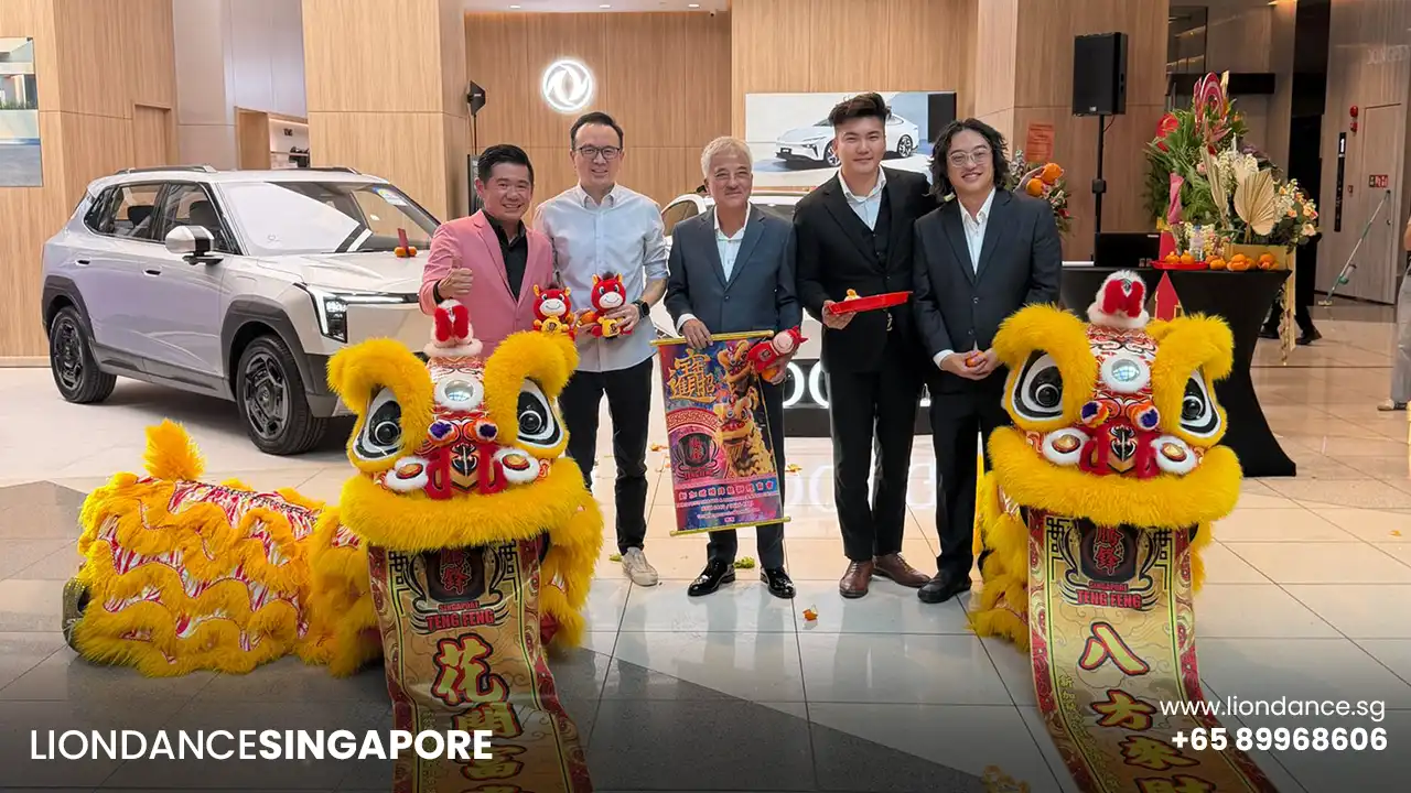 client pose with two lions after performance
