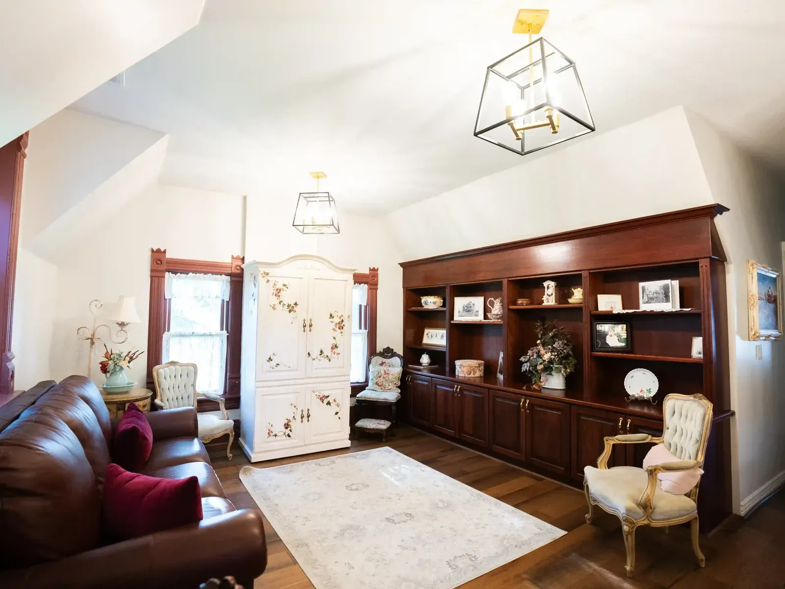 Sitting room with a leather sofa and built-in shelves