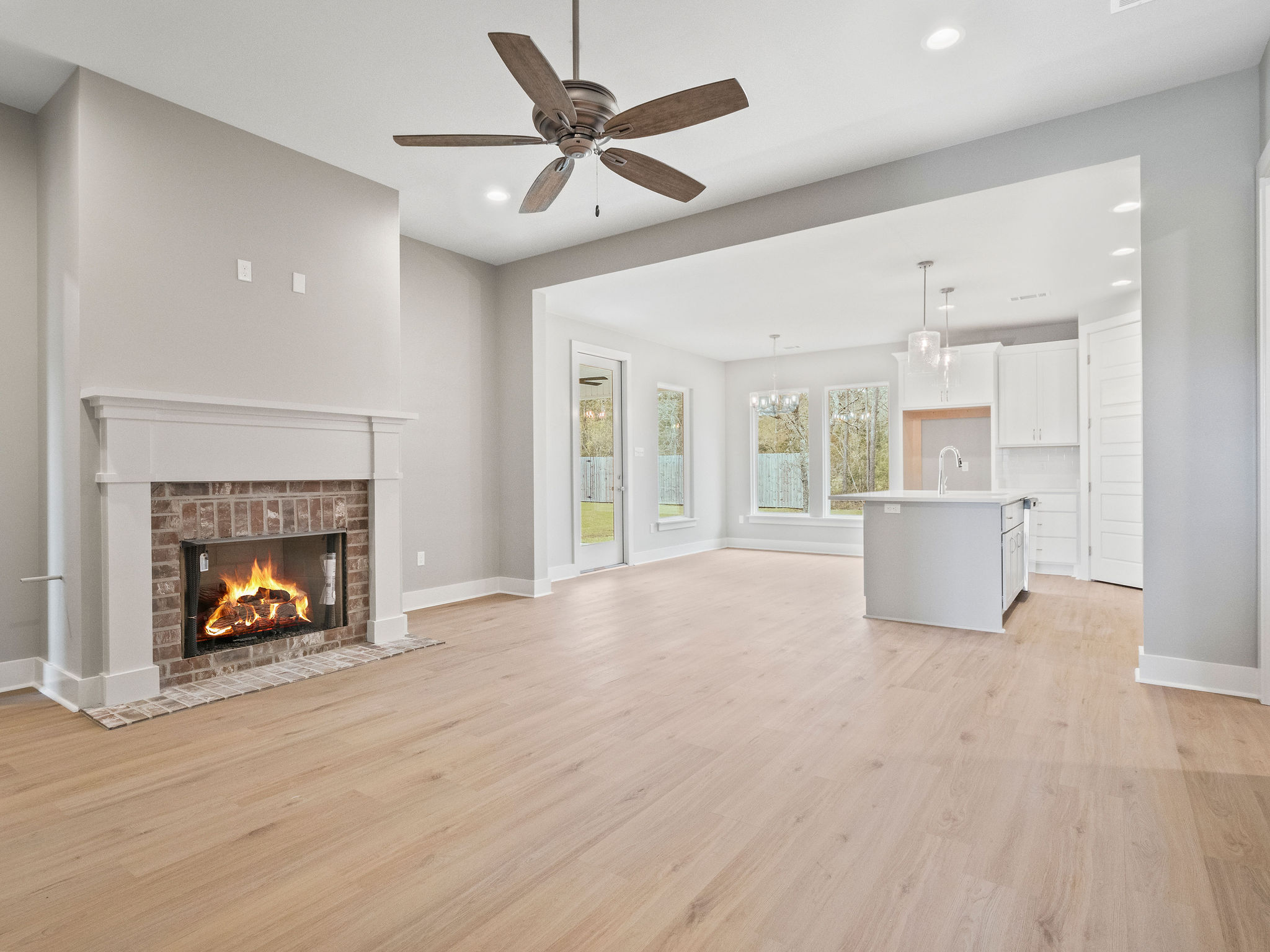 spacious open floor plan with custom gas fireplace. Perfect for entertaining
