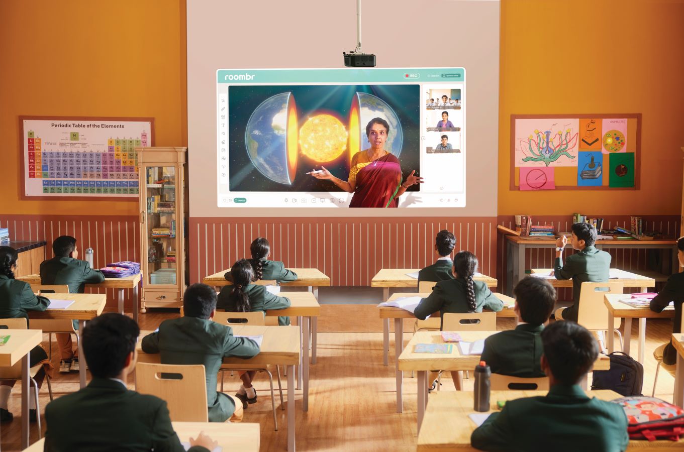 pre-recorded lesson on a digital board in classroom