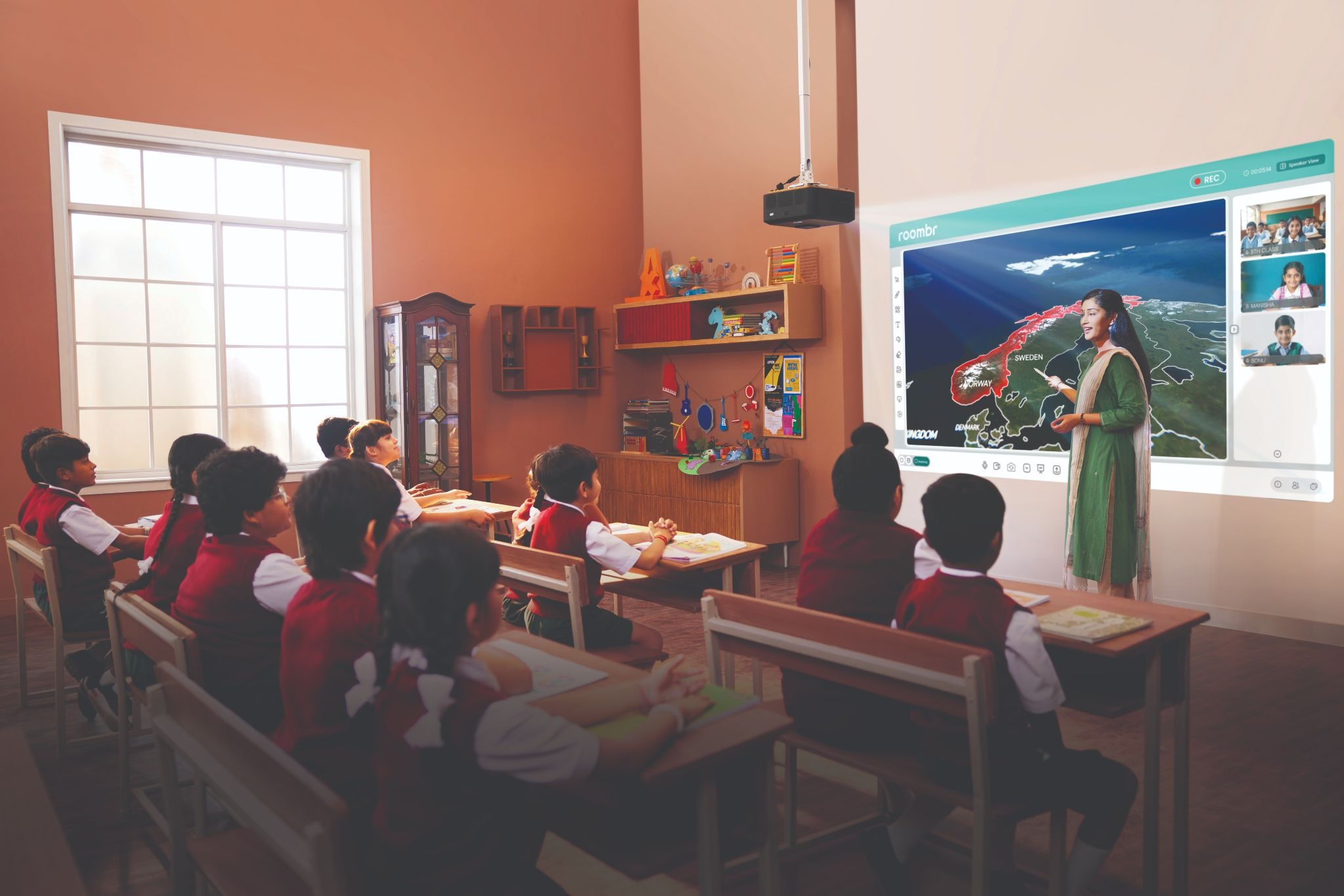 Roombr hardware mounted on ceiling transforming a classroom wall into a large interactive display 