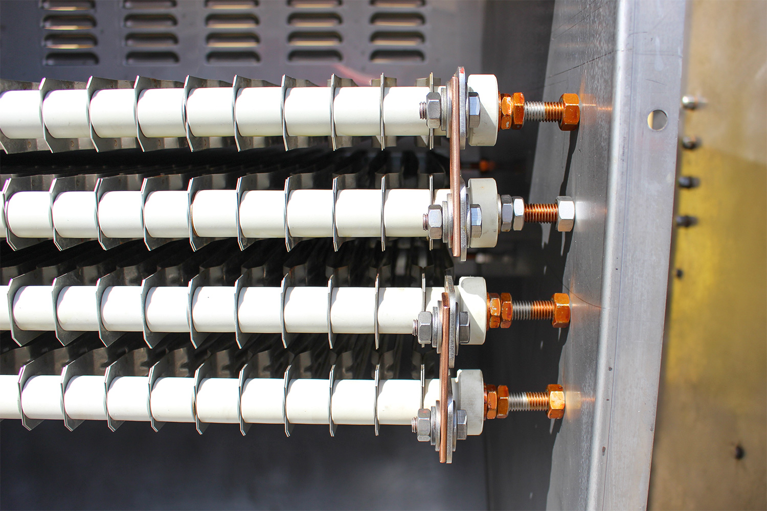 Cleaned resistor element banks mounted on new white ceramic insulators
