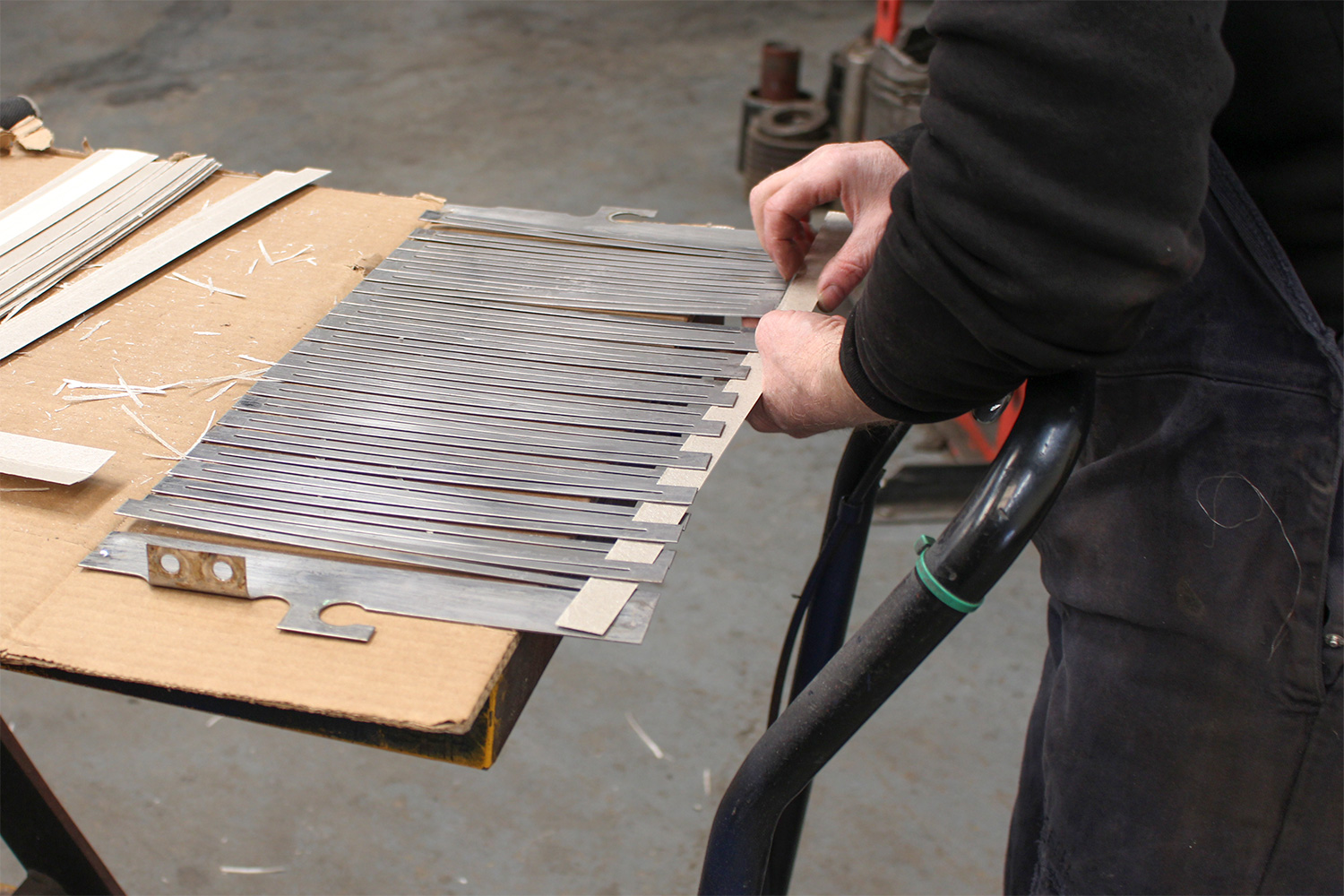 Resistor grid elements laid out on the bench for inspection